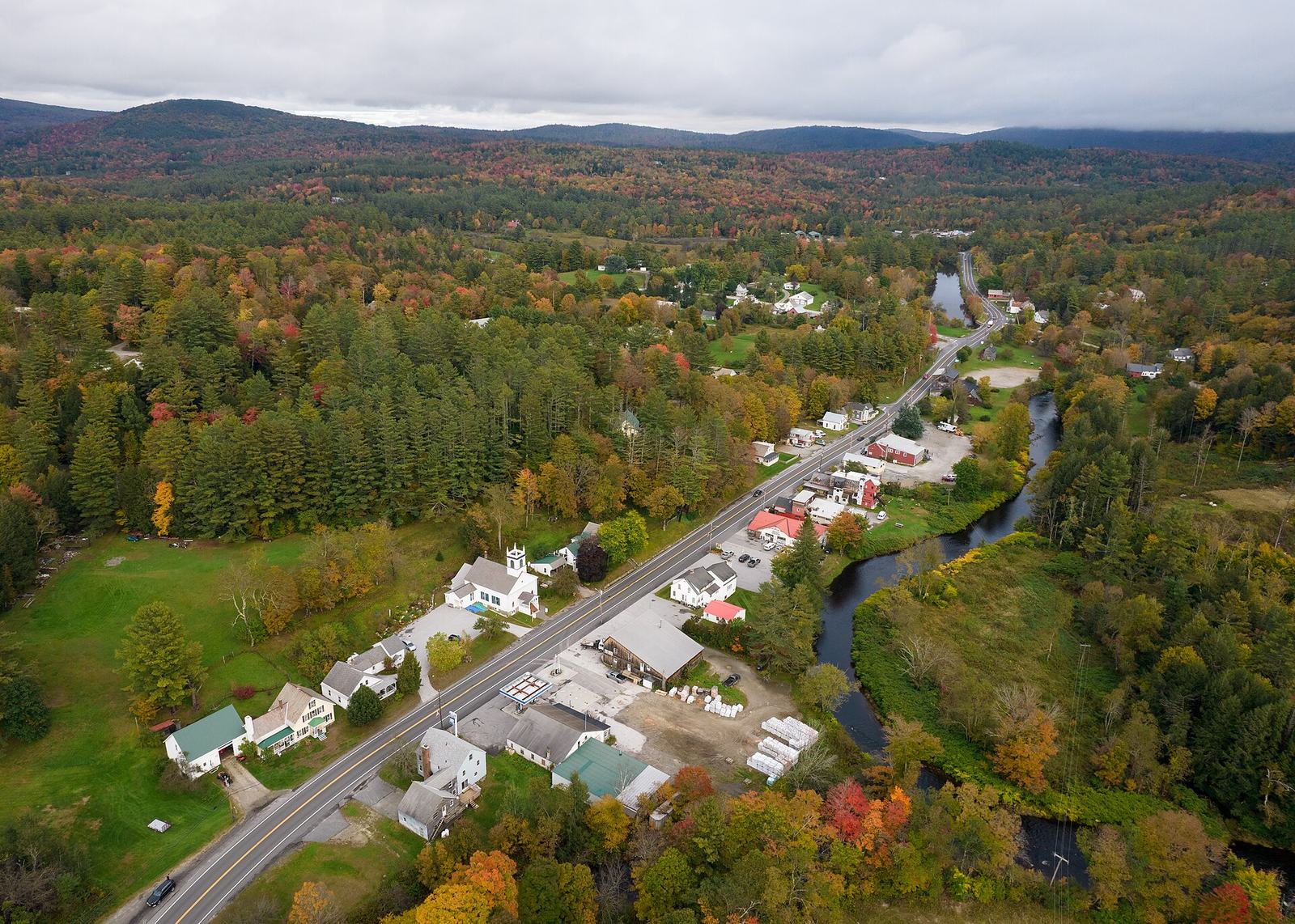 Londonderry, a village on Route 100, with the road running through hills of fall color.